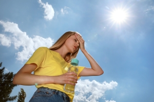Woman suffering from heat stroke